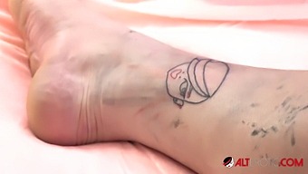 Lesbian Couple Darcy And Kenny Get Tattooed And Fucked By Evilyn
